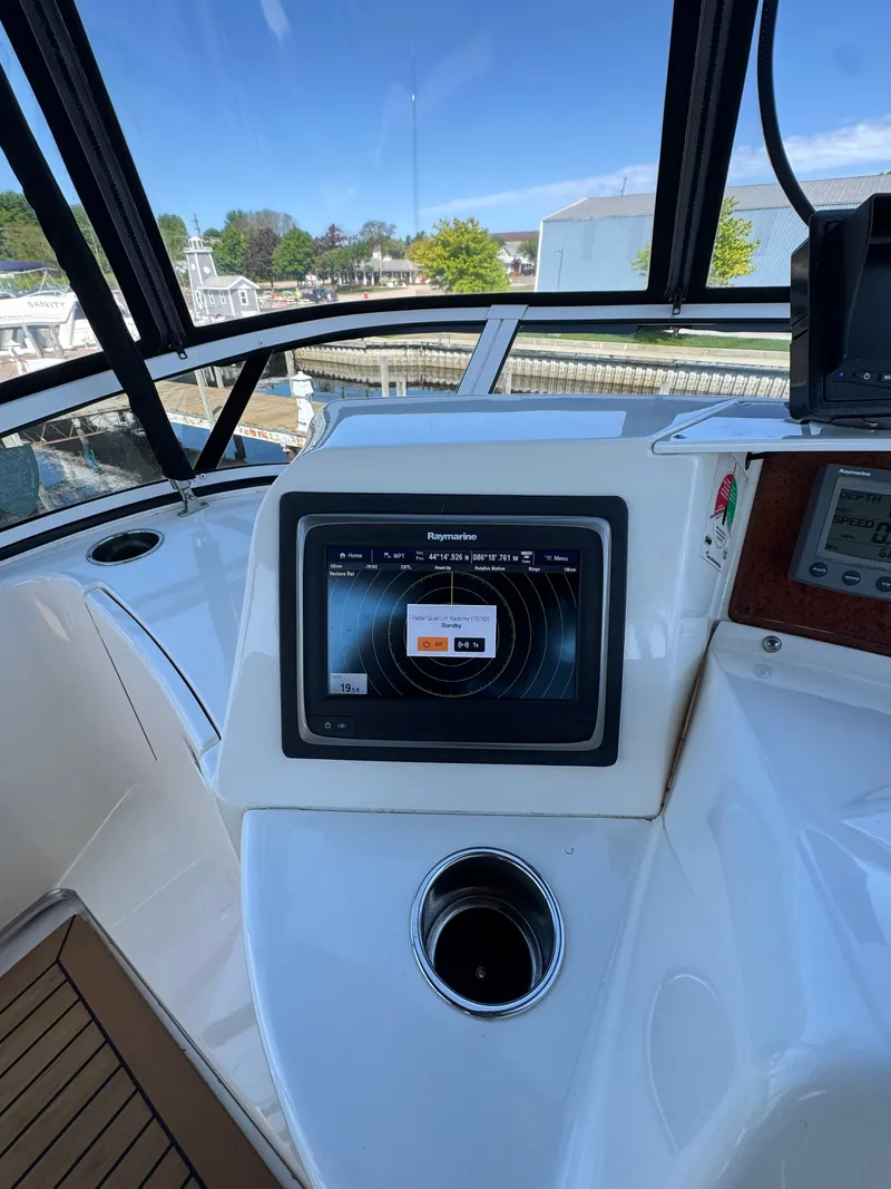 Slide: The Image of Interior view of 2002 Silverton 39 Motor Yacht with navigation system. - 23