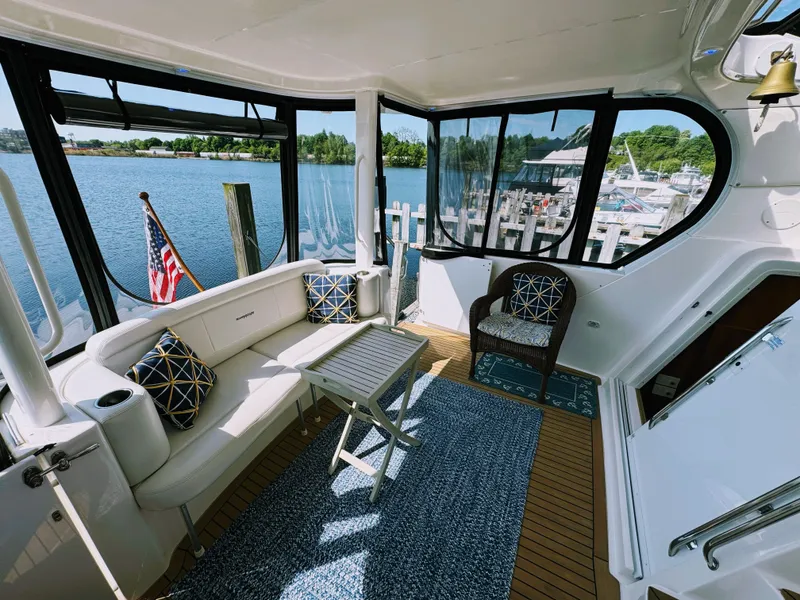 Slide: The Image of Interior of a 2002 Silverton 39 Motor Yacht with lake view. - 29