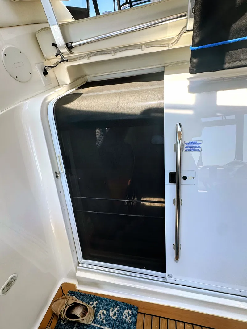 Slide: The Image of Sliding door on a 2002 Silverton 39 Motor Yacht. - 33