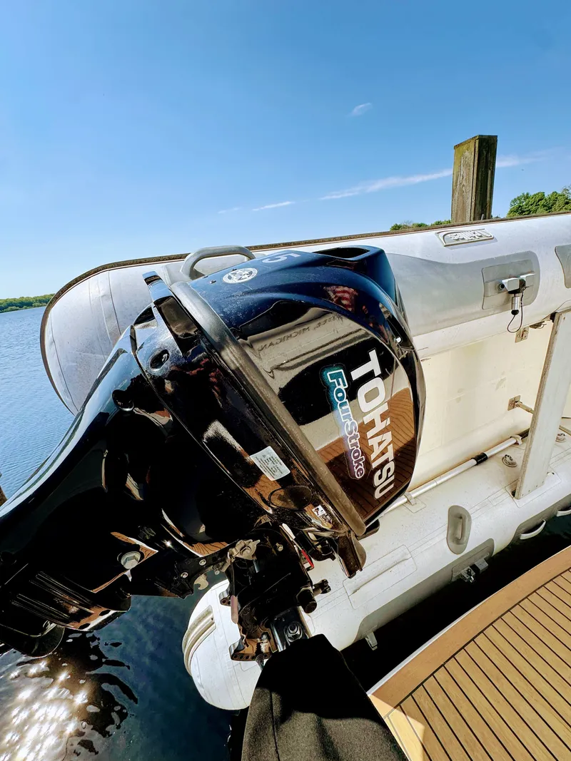 Slide: The Image of Tohatsu outboard motor on a 2002 Silverton 39 Motor Yacht. - 36
