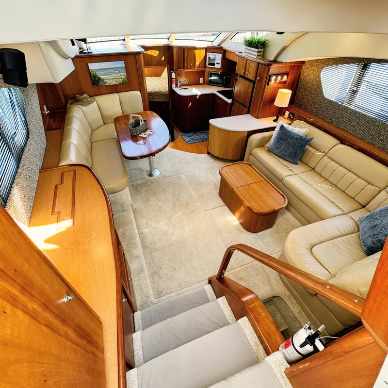 Slide: The Image of Interior of a 2002 Silverton 39 Motor Yacht with elegant furnishings. - 40