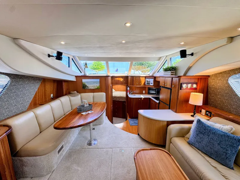 Slide: The Image of Interior of 2002 Silverton 39 Motor Yacht with elegant furnishings. - 43