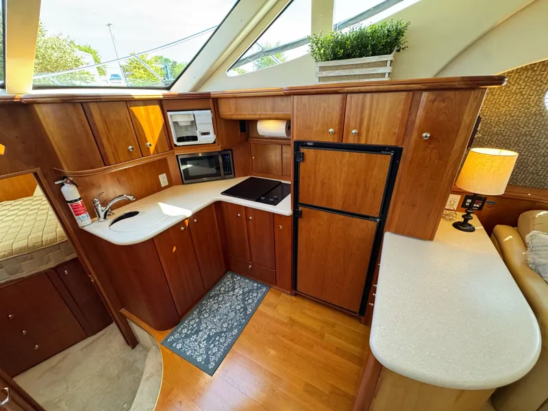 Slide: The Image of Interior of 2002 Silverton 39 Motor Yacht with modern kitchen. - 48