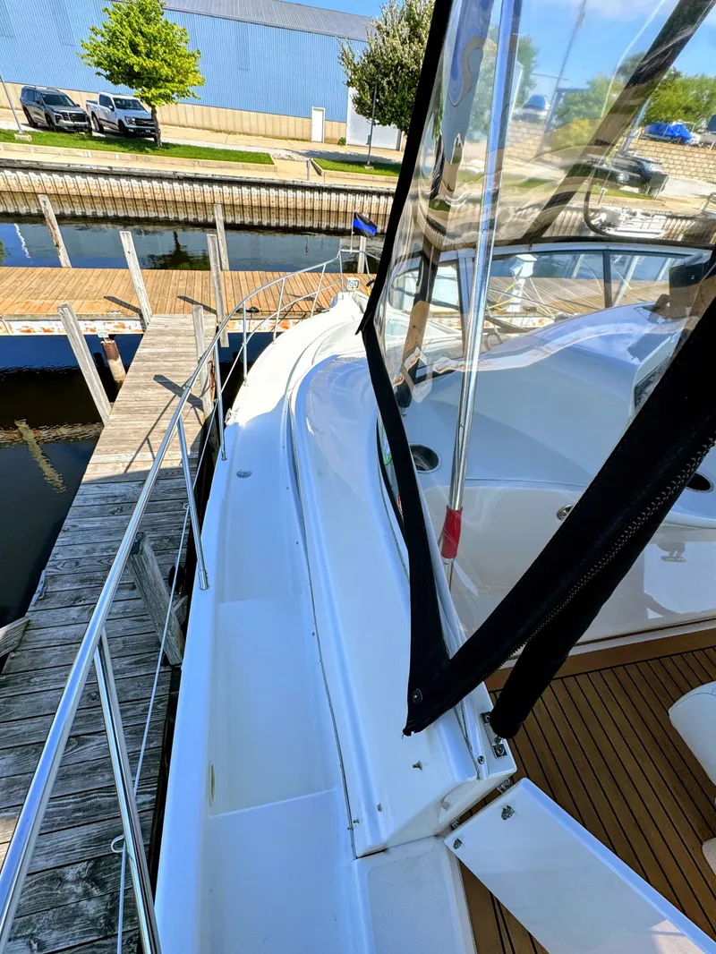 Slide: The Image of 2002 Silverton 39 Motor Yacht at dock, side view. - 7