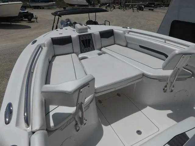Slide: The Image of Interior view of 2023 Wellcraft 222 Fisherman boat with seating area. - 12
