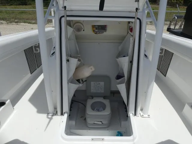 Slide: The Image of Interior of 2023 Wellcraft 222 Fisherman featuring a toilet. - 15