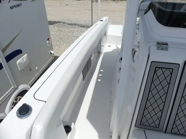 Slide: The Image of Interior view of a 2023 Wellcraft 222 Fisherman boat deck. - 16