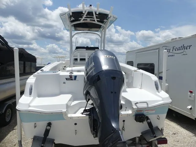 Slide: The Image of 2023 Wellcraft 222 Fisherman boat with Yamaha engine, side view. - 5
