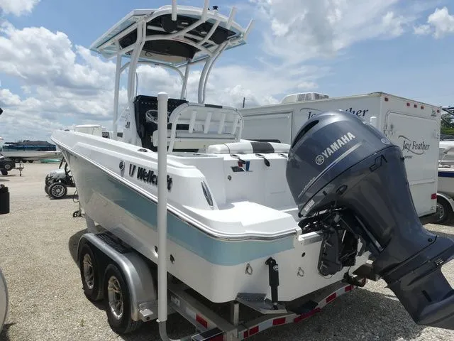 Slide: The Image of 2023 Wellcraft 222 Fisherman boat with Yamaha engine on trailer. - 6
