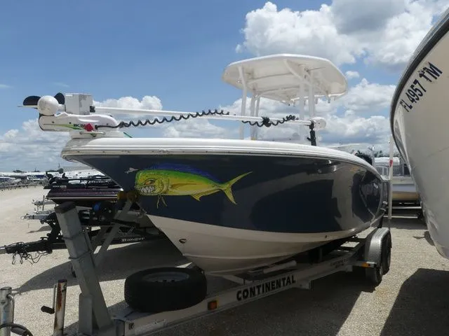 The Image of 2018 Tidewater 22 LXF boat on trailer under blue sky. - 1