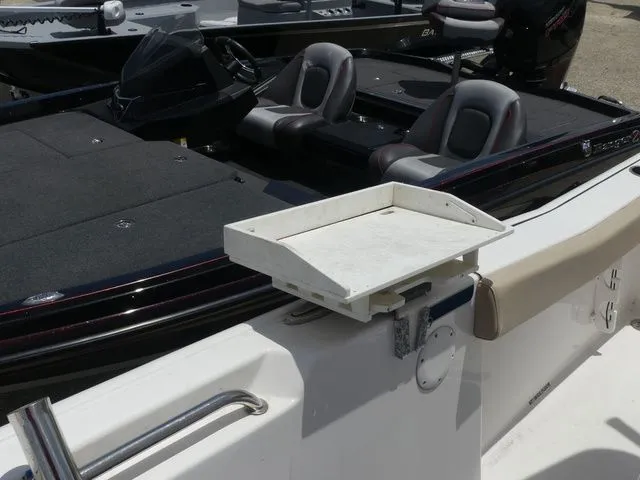 Slide: The Image of 2018 Tidewater 22 LXF boat with seating and tray. - 16