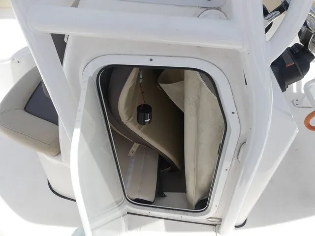 Slide: The Image of Interior of a 2018 Tidewater 22 LXF boat with open door. - 17