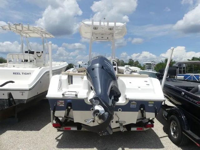 Slide: The Image of Rear view of a 2018 Tidewater 22 LXF boat with outboard motor. - 5