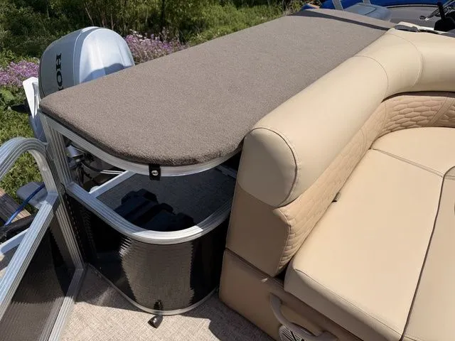 Slide: The Image of Montego Bay Pontoons C8520 DLX 2023 with beige seating area. - 15