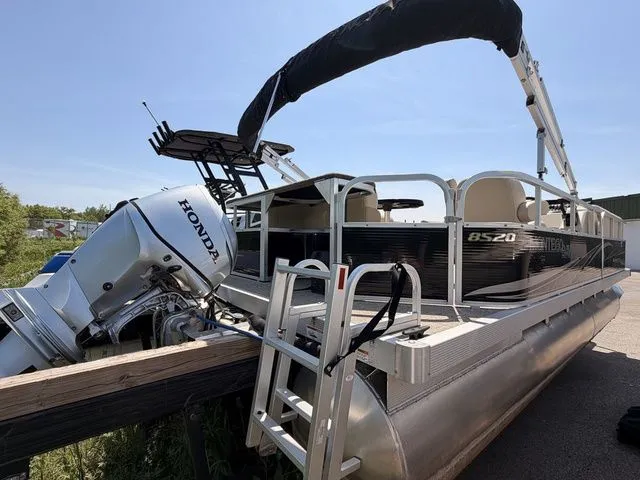 Slide: The Image of 2023 Montego Bay Pontoons C8520 DLX with Honda engine, side view. - 4