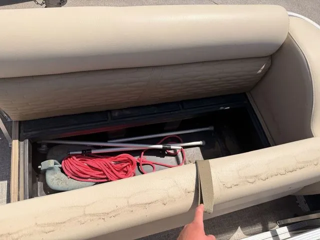 Slide: The Image of Storage compartment in Montego Bay Pontoon C8520 DLX, 2023 model. - 9