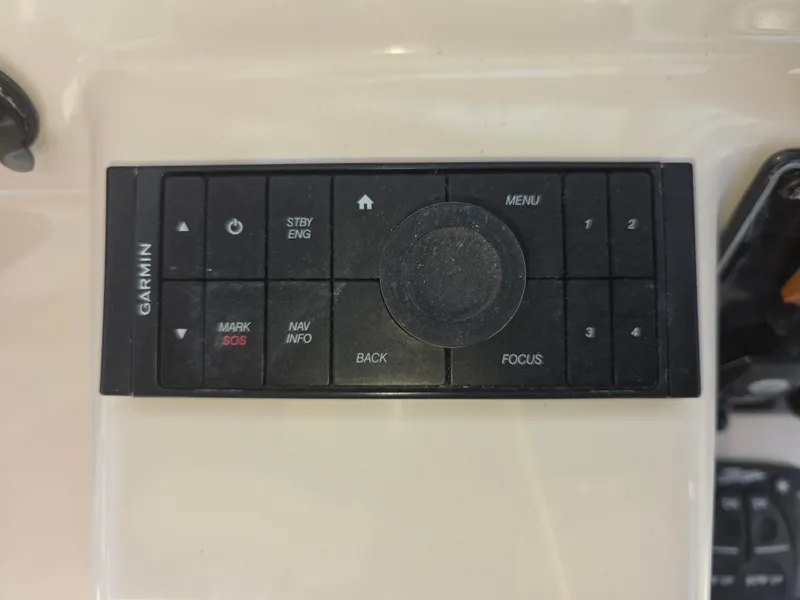 Slide: The Image of Garmin control panel on 2019 Grady-White Freedom 275. - 26