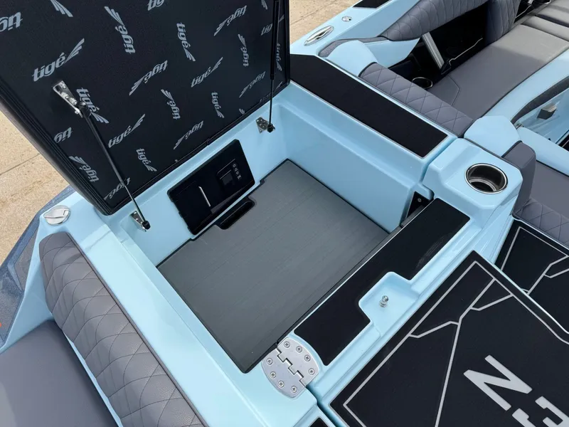 Slide: The Image of Interior of 2026 Tigé Z3 boat with storage and upholstery. - 12
