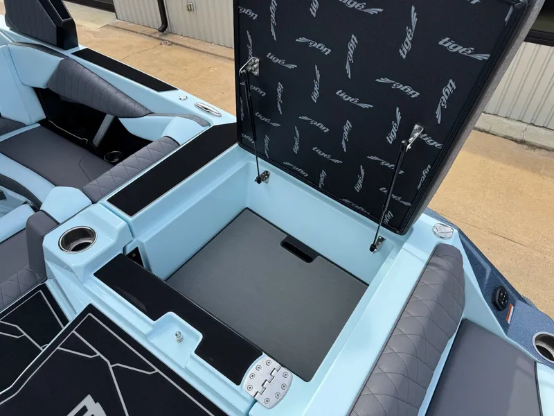 Slide: The Image of Interior of 2026 Tigé Z3 with open storage compartment. - 13