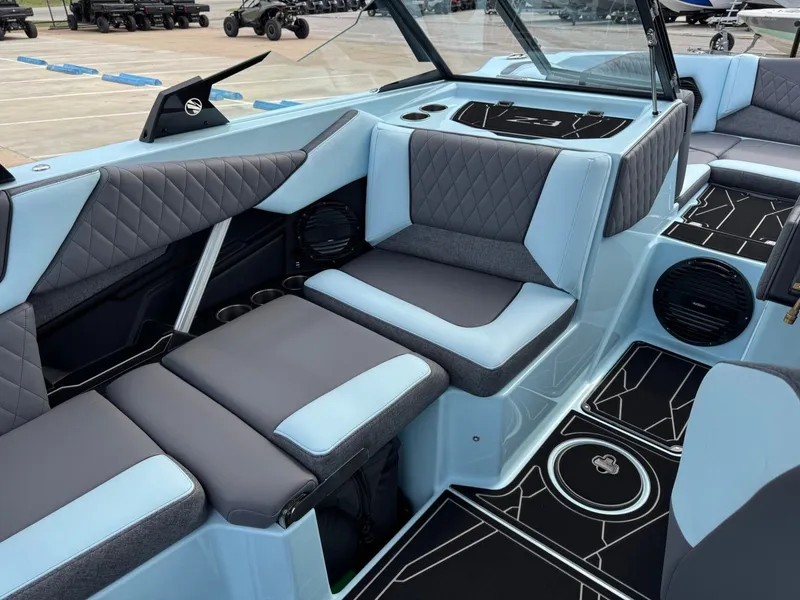 Slide: The Image of 2026 Tigé Z3 boat interior with luxurious seating and design. - 16