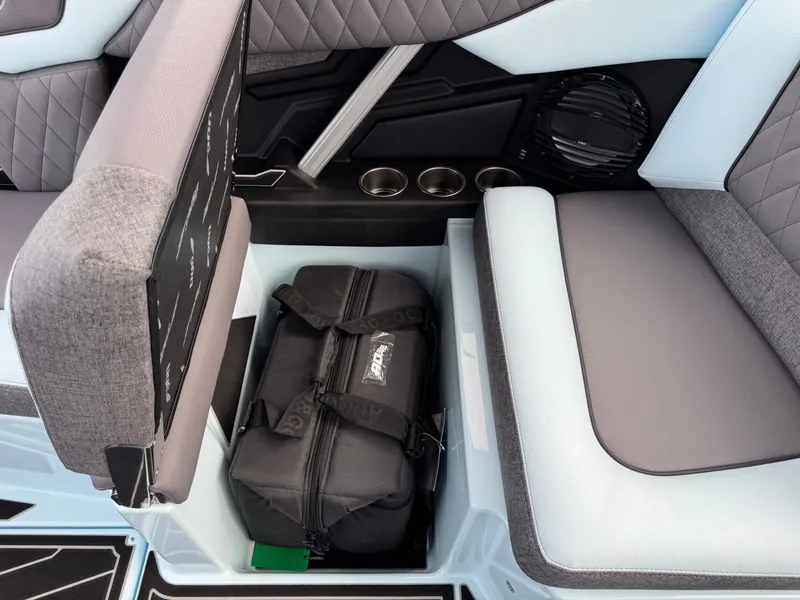 Slide: The Image of Interior of 2026 Tigé Z3 with storage compartment and bag. - 18