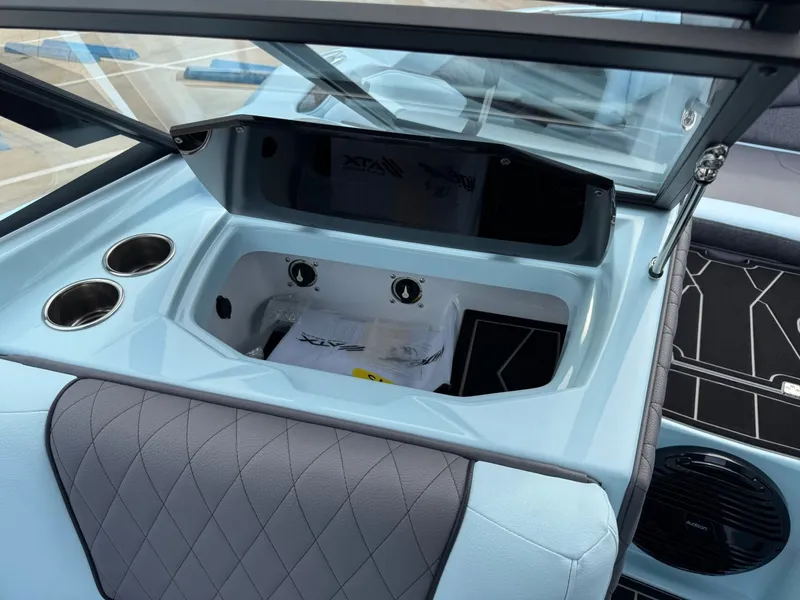 Slide: The Image of Interior of 2026 Tigé Z3 with cup holders and storage compartment. - 19