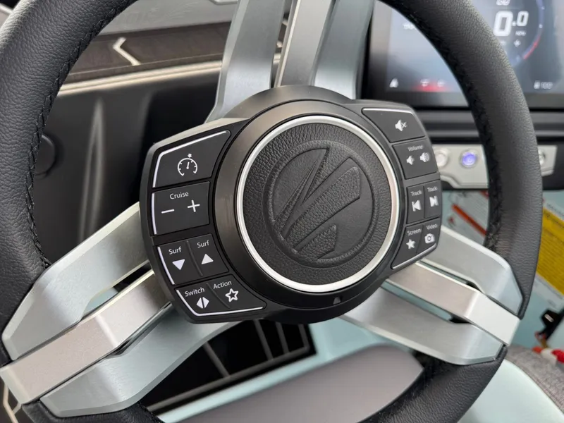 Slide: The Image of 2026 Tigé Z3 steering wheel with control buttons. - 22