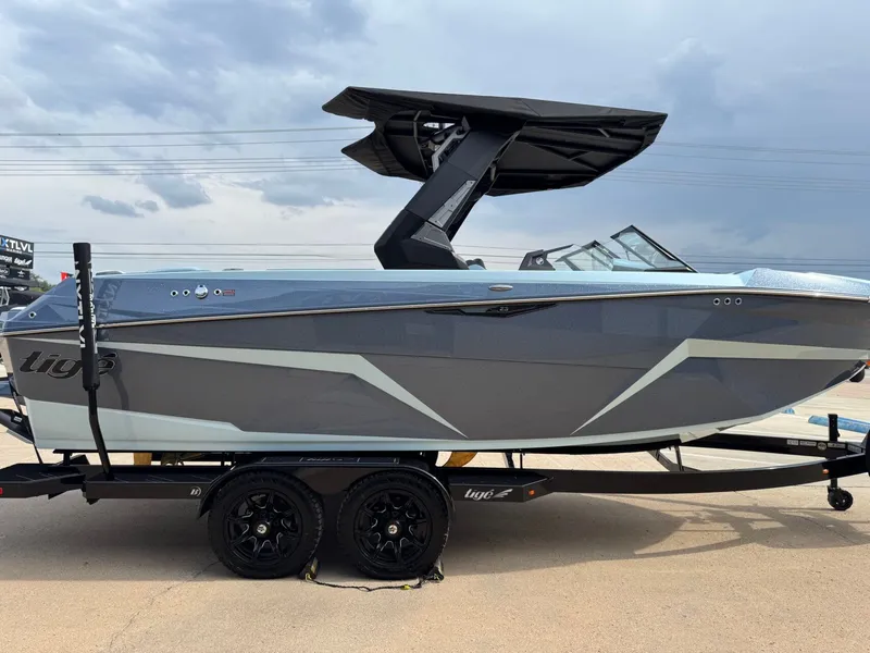 Slide: The Image of 2026 Tigé Z3 boat on trailer, side view. - 4
