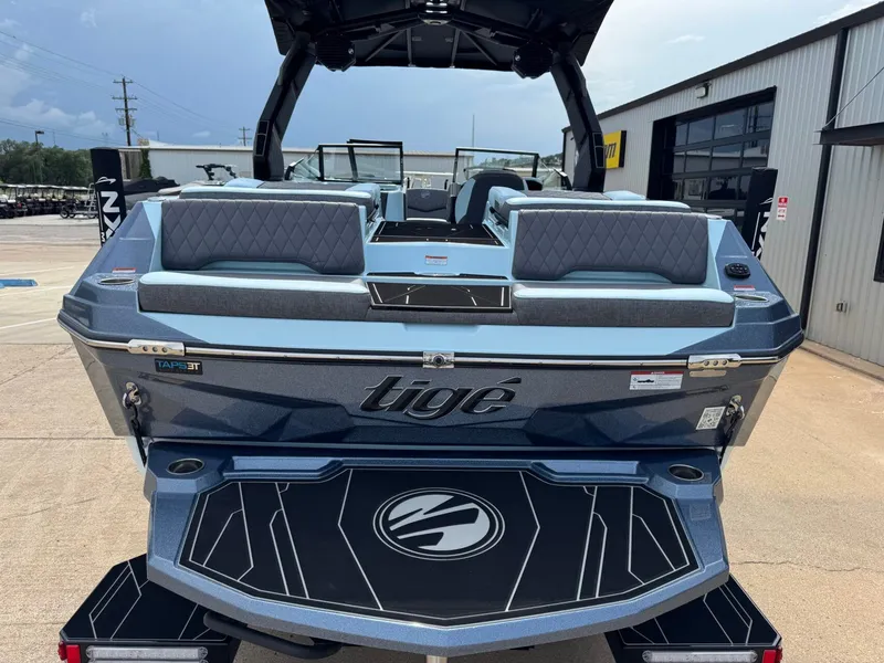 Slide: The Image of Rear view of 2026 Tigé Z3 boat on a parking lot. - 7