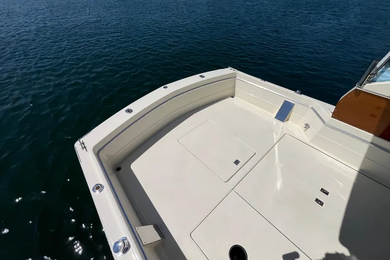 Slide: The Image of 1966 Chris-Craft 27 Commander boat deck with water view. - 18
