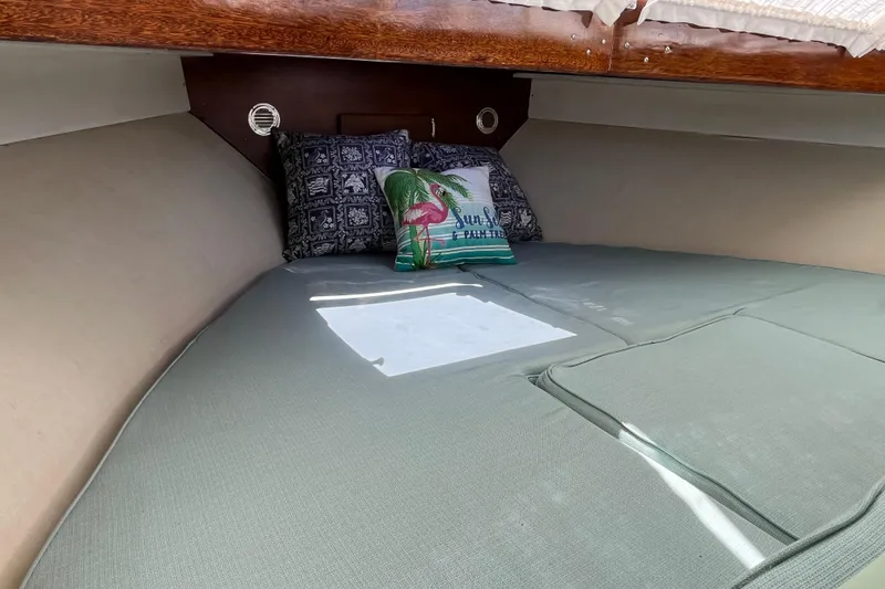 Slide: The Image of Cozy cabin interior of 1966 Chris-Craft 27 Commander with decorative pillows. - 39