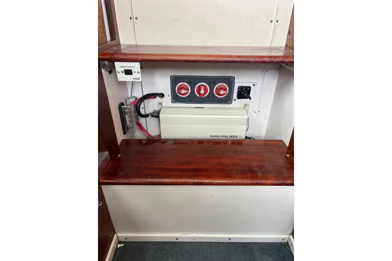 Slide: The Image of Electrical panel of 1966 Chris-Craft 27 Commander boat with switches and power inverter. - 44