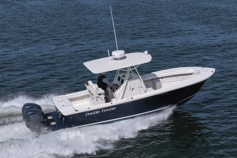The Image of 2019 Regulator 28 Forward Seating boat cruising on open water. - 0