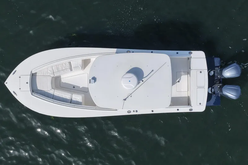 Slide: The Image of Overhead view of 2019 Regulator 28 Forward Seating boat on water. - 17