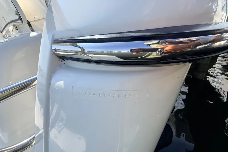 Slide: The Image of 1995 Tiara Yachts 4000 Express boat with visible hull identification number. - 11