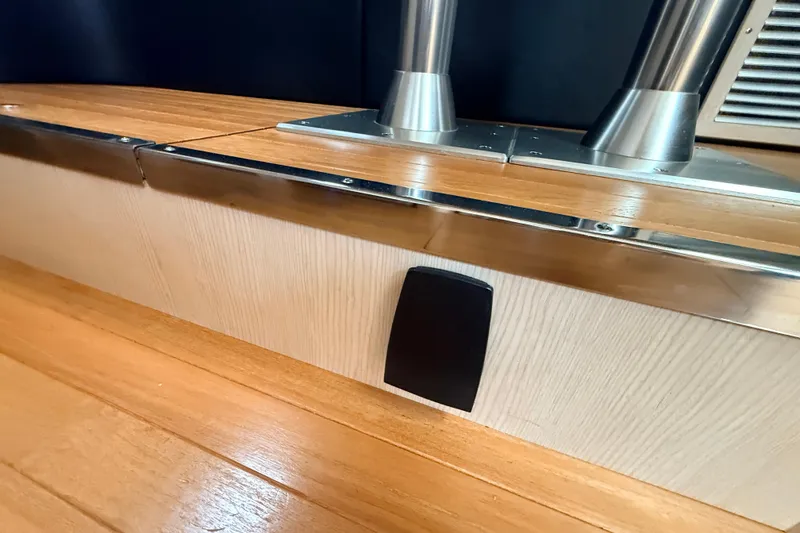 Slide: The Image of Interior detail of 1995 Tiara Yachts 4000 Express, showcasing wood and metal finishes. - 42