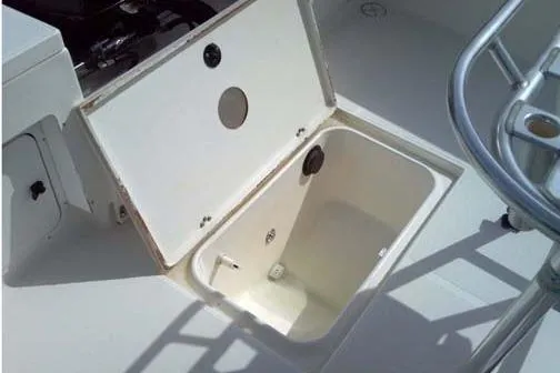 Slide: The Image of 2001 Sea Craft Master Angler 21 boat storage compartment open on deck. - 8