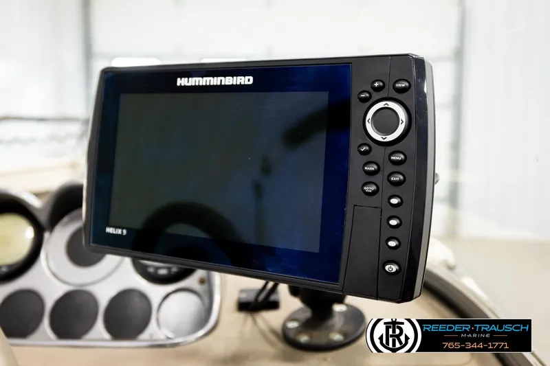 Slide: The Image of Humminbird Helix 5 fish finder on 2004 Crestliner 2050 Sportfish boat dashboard. - 31