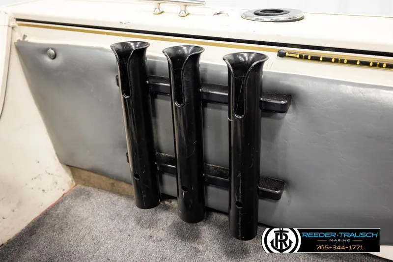 Slide: The Image of Rod holders on a 2004 Crestliner 2050 Sportfish boat interior. - 44