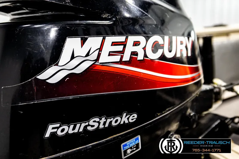 Slide: The Image of Mercury FourStroke engine on 2004 Crestliner 2050 Sportfish boat, Reeder-Trausch Marine branding. - 54