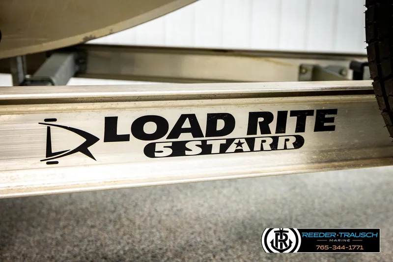 Slide: The Image of Load Rite 5 Starr trailer for 2004 Crestliner 2050 Sportfish boat, Reeder-Trausch Marine branding. - 58