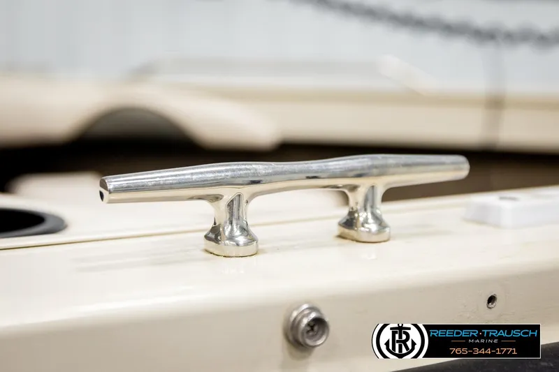 Slide: The Image of Close-up of a 2004 Crestliner 2050 Sportfish boat cleat, showcasing its sleek metal design. - 60