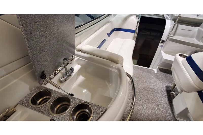 Slide: The Image of Interior of 2006 Formula 330 Sun Sport boat with sink and seating area. - 16