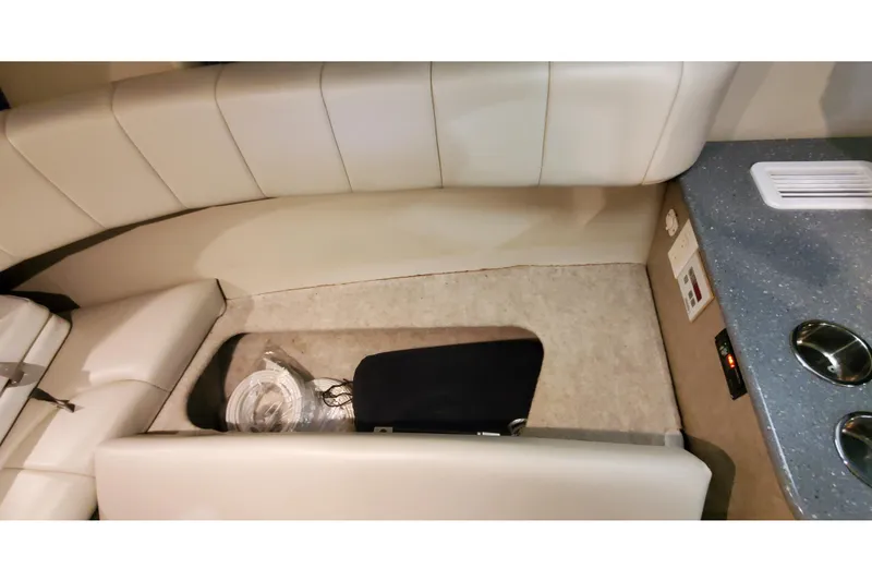 Slide: The Image of Interior of 2006 Formula 330 Sun Sport boat with seating and countertop. - 35