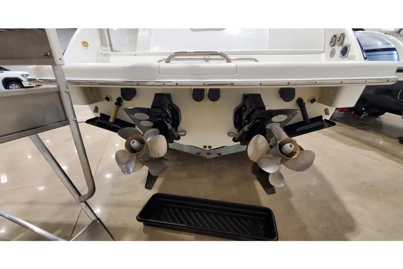 Slide: The Image of Rear view of a 2006 Formula 330 Sun Sport boat with dual propellers. - 41