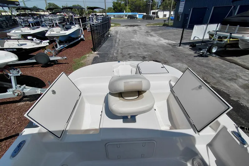 Slide: The Image of 2021 Carolina Skiff 21 LS boat interior with open storage compartments. - 14