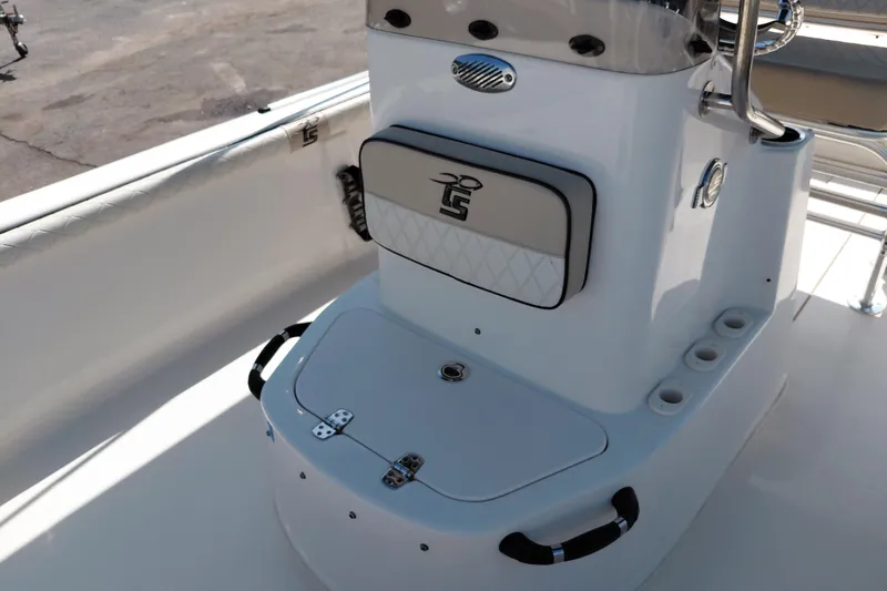 Slide: The Image of 2021 Carolina Skiff 21 LS boat interior with storage and seating area. - 17