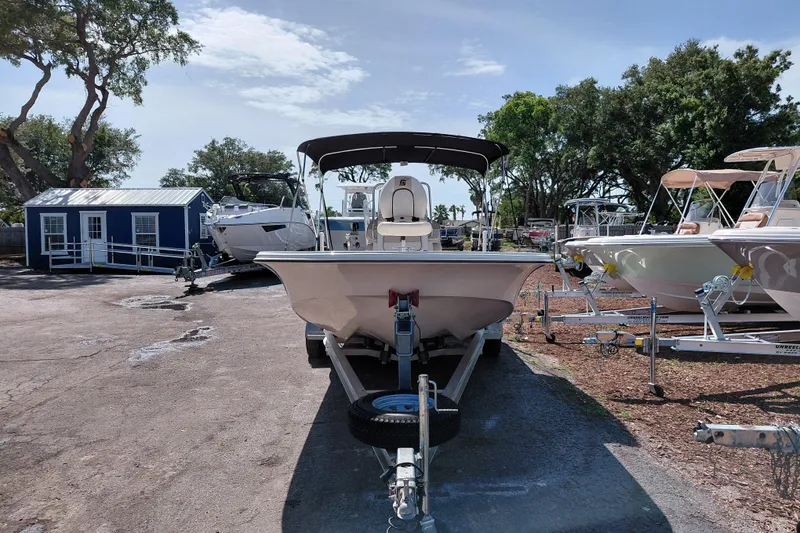 Slide: The Image of 2021 Carolina Skiff 21 LS boat on trailer in outdoor lot. - 2