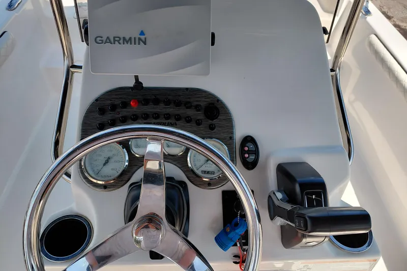 Slide: The Image of Steering console of 2021 Carolina Skiff 21 LS with Garmin navigation system. - 23