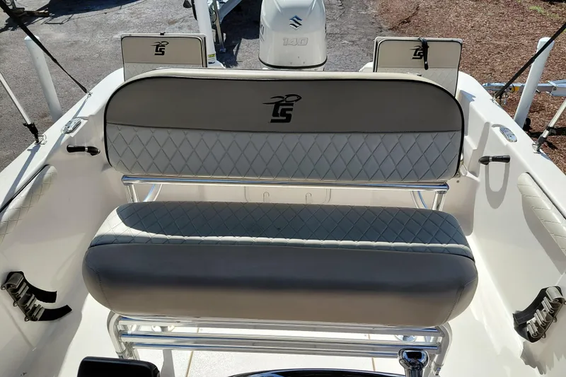 Slide: The Image of 2021 Carolina Skiff 21 LS boat interior with cushioned seating and sleek design. - 25